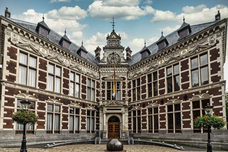 19 Adorable Cities to Visit in the Netherlands 2 Corner building in Utrecht, one of the most beautiful cities in the Netherlands.